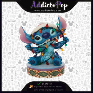 Disney Traditions – Figurine Stitch Enroulé dans une Guirlande de Noël – Jim Shore – Enesco